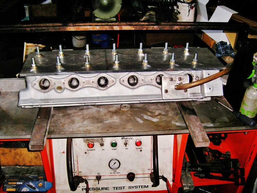 Pressure testing an Aston Martin 6 cylinder head