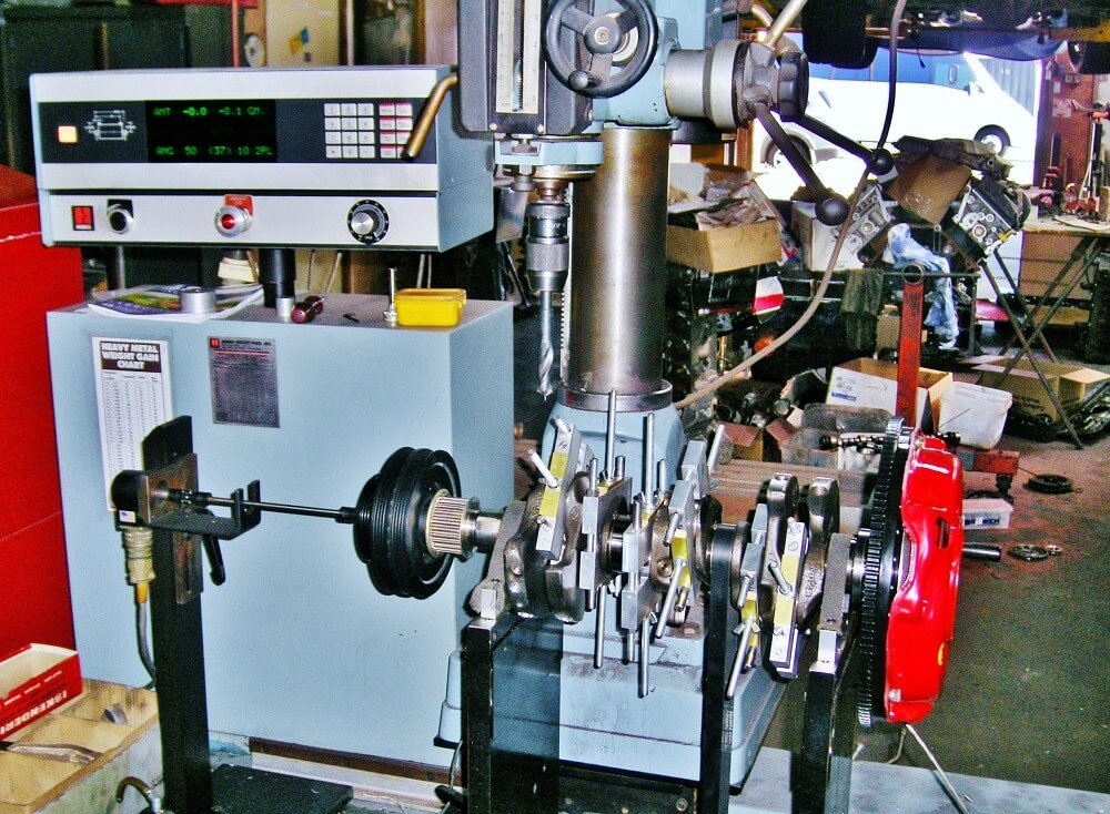 Nissan VG30 V6 crankshaft assembly being balanced on our Hines computerised dynamic balancing machine
